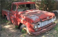 1960 Red Ford F100 pick up with no motor and no