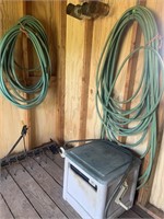 3 garden hoses & reel box
