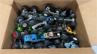 Box of hot wheels monster truck die cast
