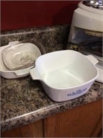 2 Corning Ware dishes with 1 lid that fits both
