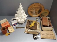 Group including ceramic tree, leather glove, teddy