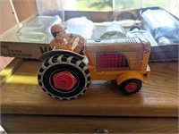 Vintage TN Toys Friction tractor yellow tin toy