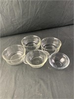 5 small glass bowls 1 is FireKing