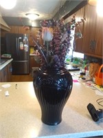Large glass vase  with contents