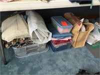 sewing material under table