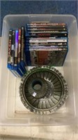 Box of Blu-ray DVDs and two decorative metal