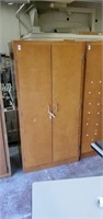 Wooden cabinet.  35 x 24 x  71 inches tall. With