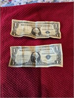 Two $1 1957 silver certificates