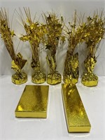 5- Foil gold weighted centerpiece, and two gold