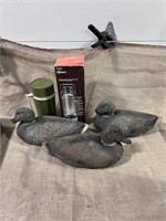 3 decoys paper and thermos bottle