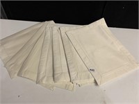 12 CREAM COLORED CLOTH PLACEMATS