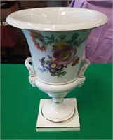 Fine hand-painted floral urn with figural handles