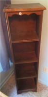 Wood bookshelf. Measures: 40"Hx13"Wx8"D.