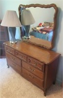 (7) Drawer dresser with mirror and lamp. Dresser