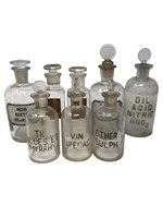 Older pharmacy glass jars apothecary bottles