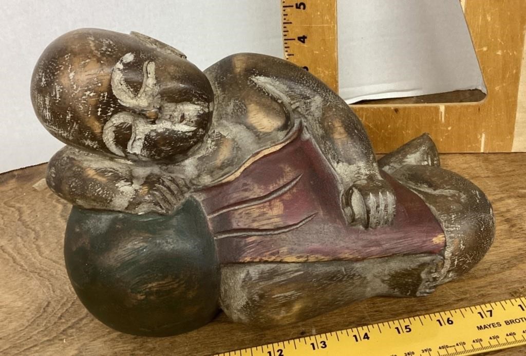 Carved wood Asian reclining figure