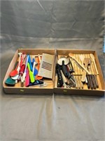 Two boxes of kitchen utensils