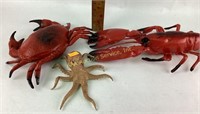 Plastic lobster, crab, rubber octopus