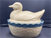 Vintage duck in basket