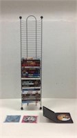 27 DVD's & 36" Metal DVD Tower Stand