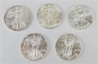 5 One Ounce Fine Silver Walking Liberty Eagles.