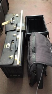 3 empty hard cases & soft briefcase