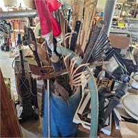 Barrel of shovels , rakes ,tools