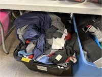 LARGE LOT OF CLOTHES CONTENTS UNDER TABLE