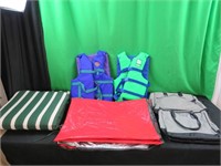 2 Life jackets, Cushion, Solar blanket, 2 bags