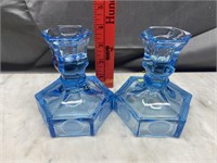 Blue fostoria coin glass candle holders