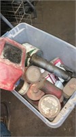 Welding helmet, grease gun, cans