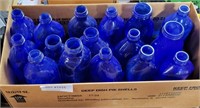 BOX OF COBALT BLUE GLASS MEDICINAL-TYPE  BOTTLES