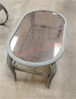 Outdoor wicker coffee table with glass top