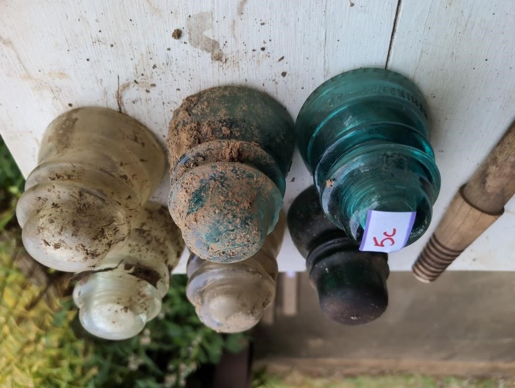 6 glass vintage insulators