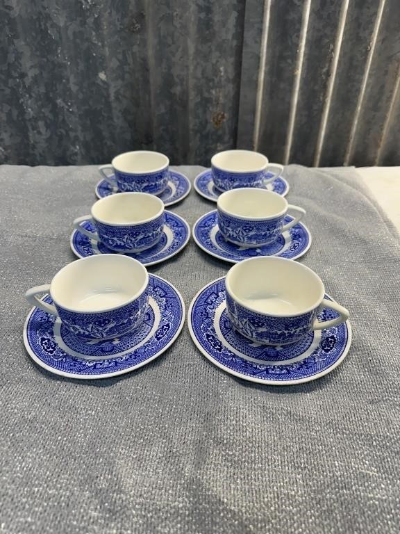 6 Flow blue tea cups and saucers
