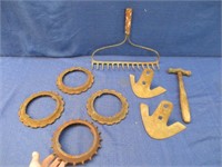 old rusty barn items (rake head-gears-etc)