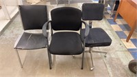 Three black chairs