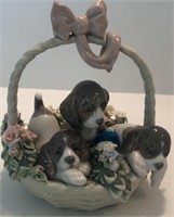 Lladro dogs in a basket