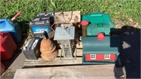 Pallet of used auto/lawn batteries and bird