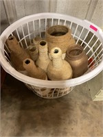 Basket of bottles/jars wrapped in rope