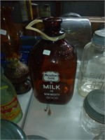 1 gal. amber Meadow Gold milk bottle