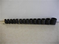 Fourteen Snap-On Sockets On Sliding Rail Organizer