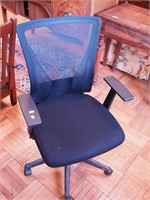 Contemporary black swivel office chair made by