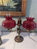 Vintage electrified double oil lamp red globe