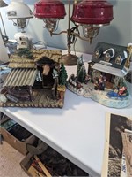 Lot of two large resin cabin Christmas home decor