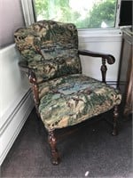 Upholstered armchair with flyfishing scene