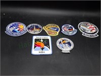 Collection of NASA patches from the 1980s