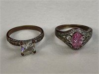 (2) Copper Ladies rings with pink and clear