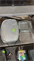Electric grill with two Pyrex baking dishes