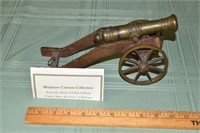 Miniature wood and brass 10" long cannon from the